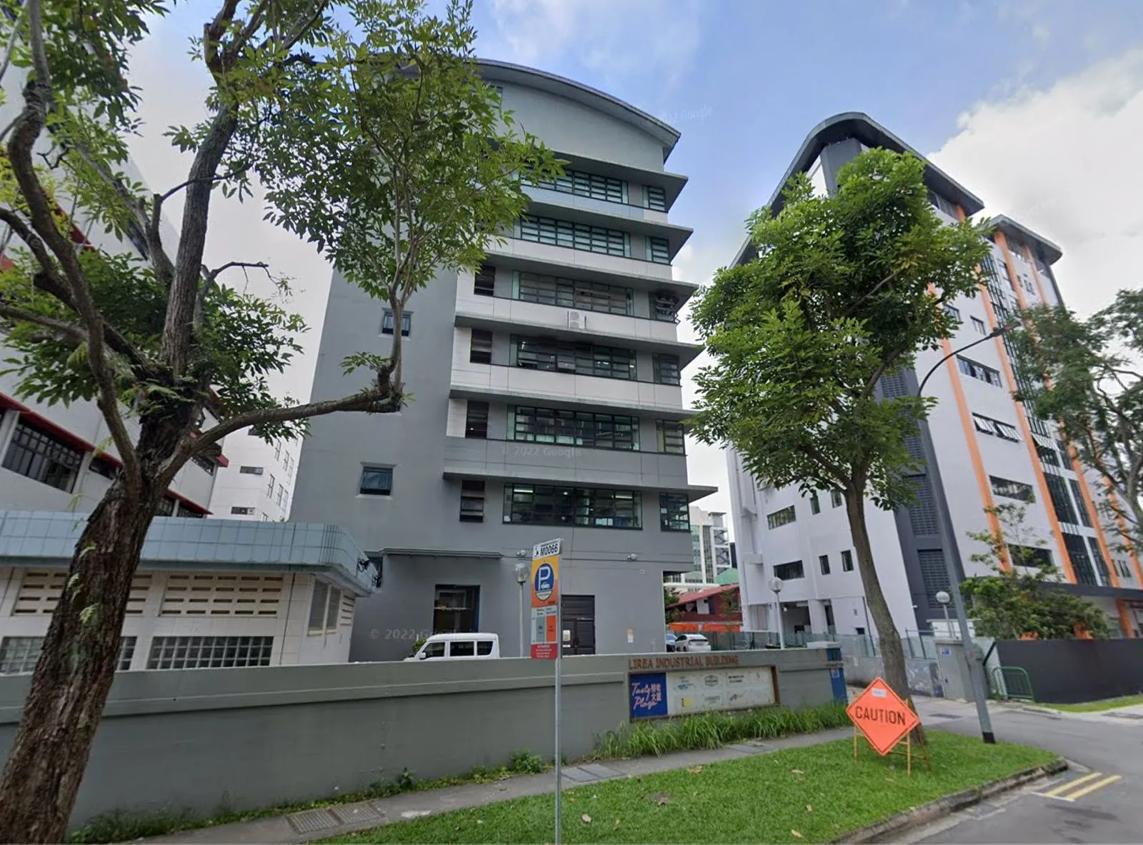 Street view of the building at 37 MacTaggart Road with trees in front